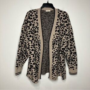 And the why animal print sweater size M/L